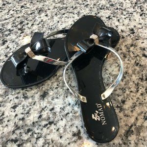 Nomad - Black And Silver Jelly Flip Flops SZ9 NWOT